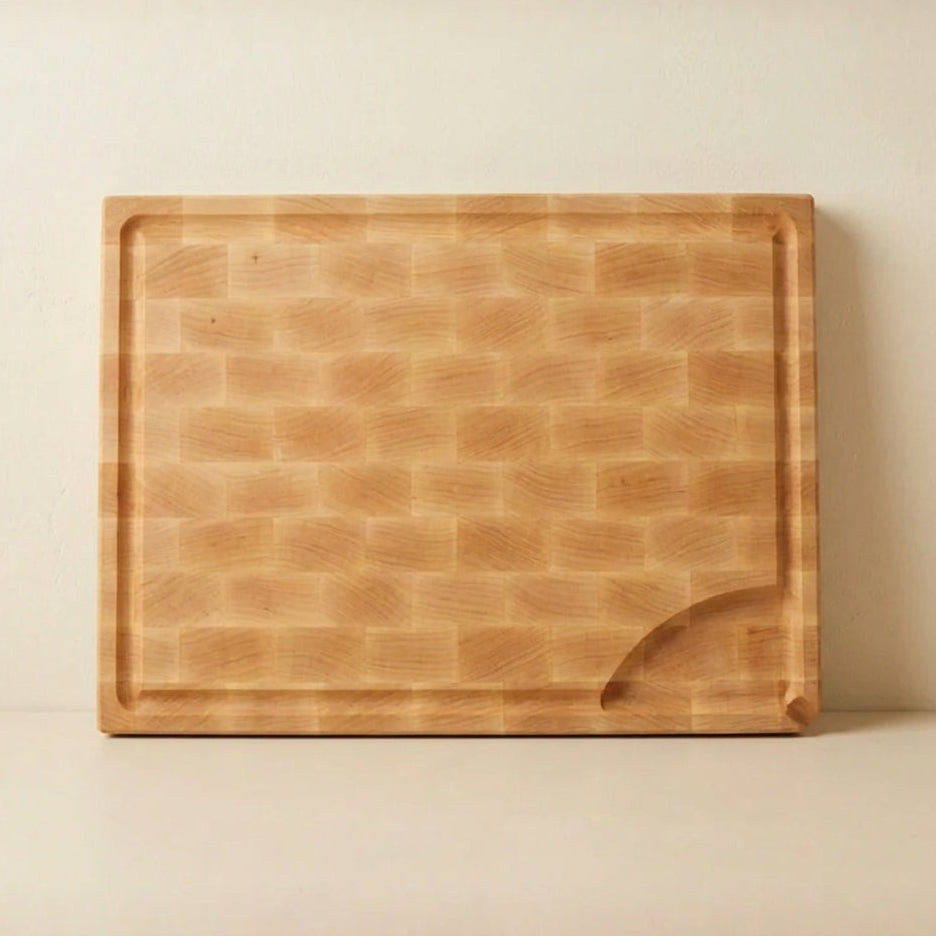 Wooden cutting board on a beige background